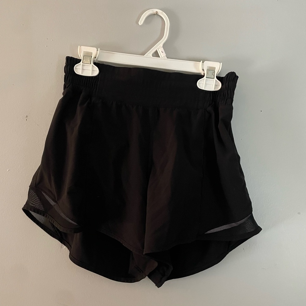 size 4 lululemon hotty hot 4” black shorts